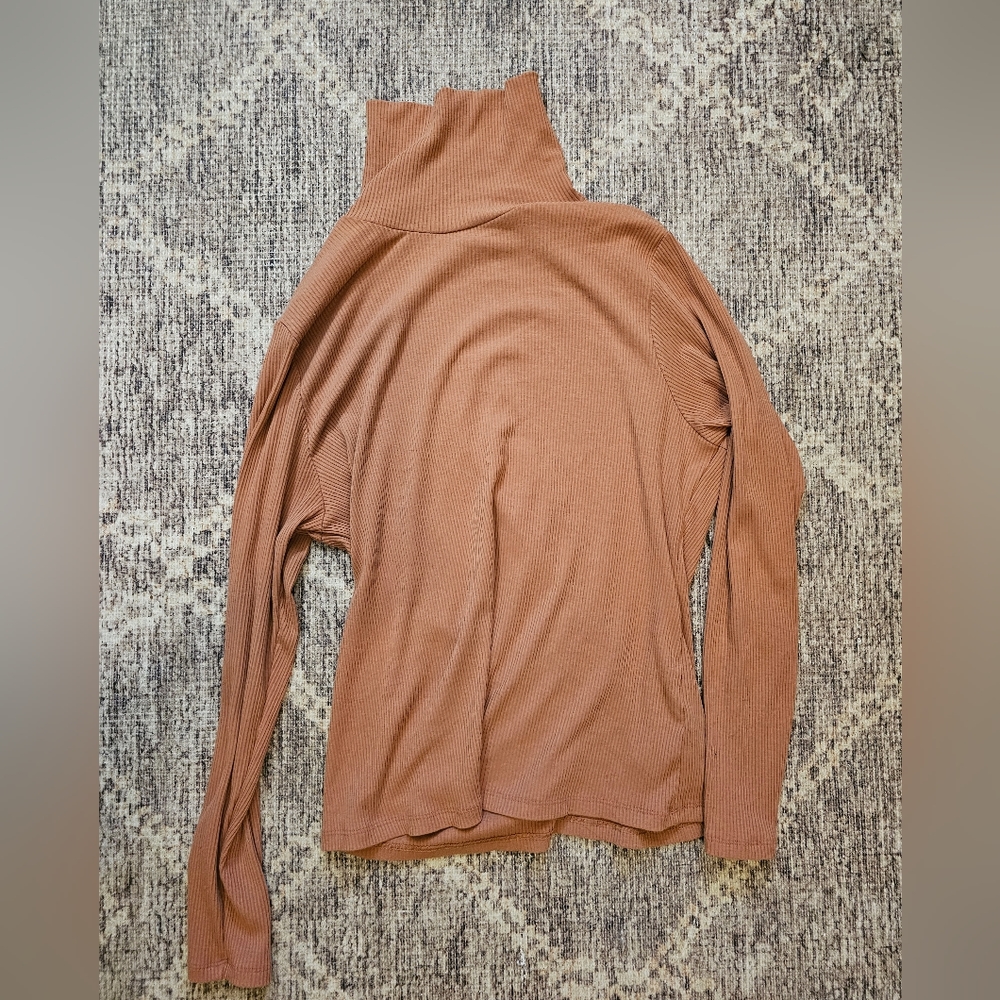 Tan ribbed turtleneck, size large